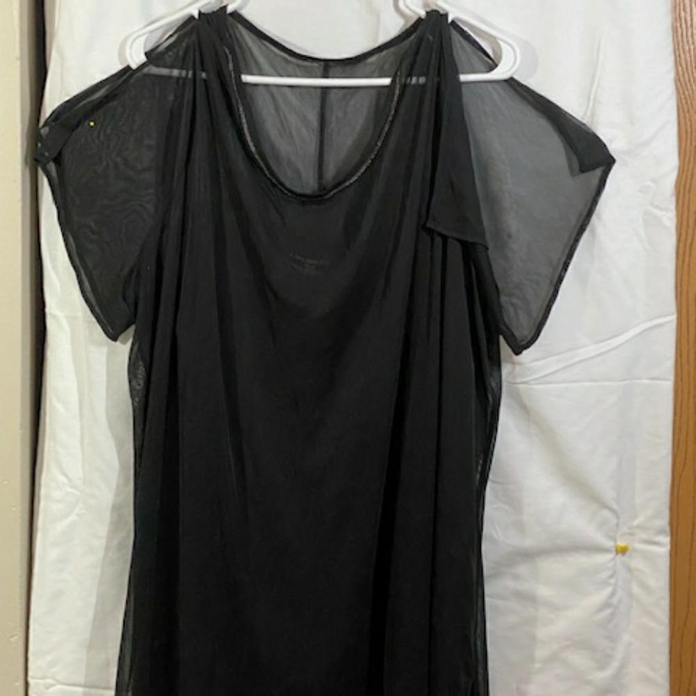 Black sheer over black cami.